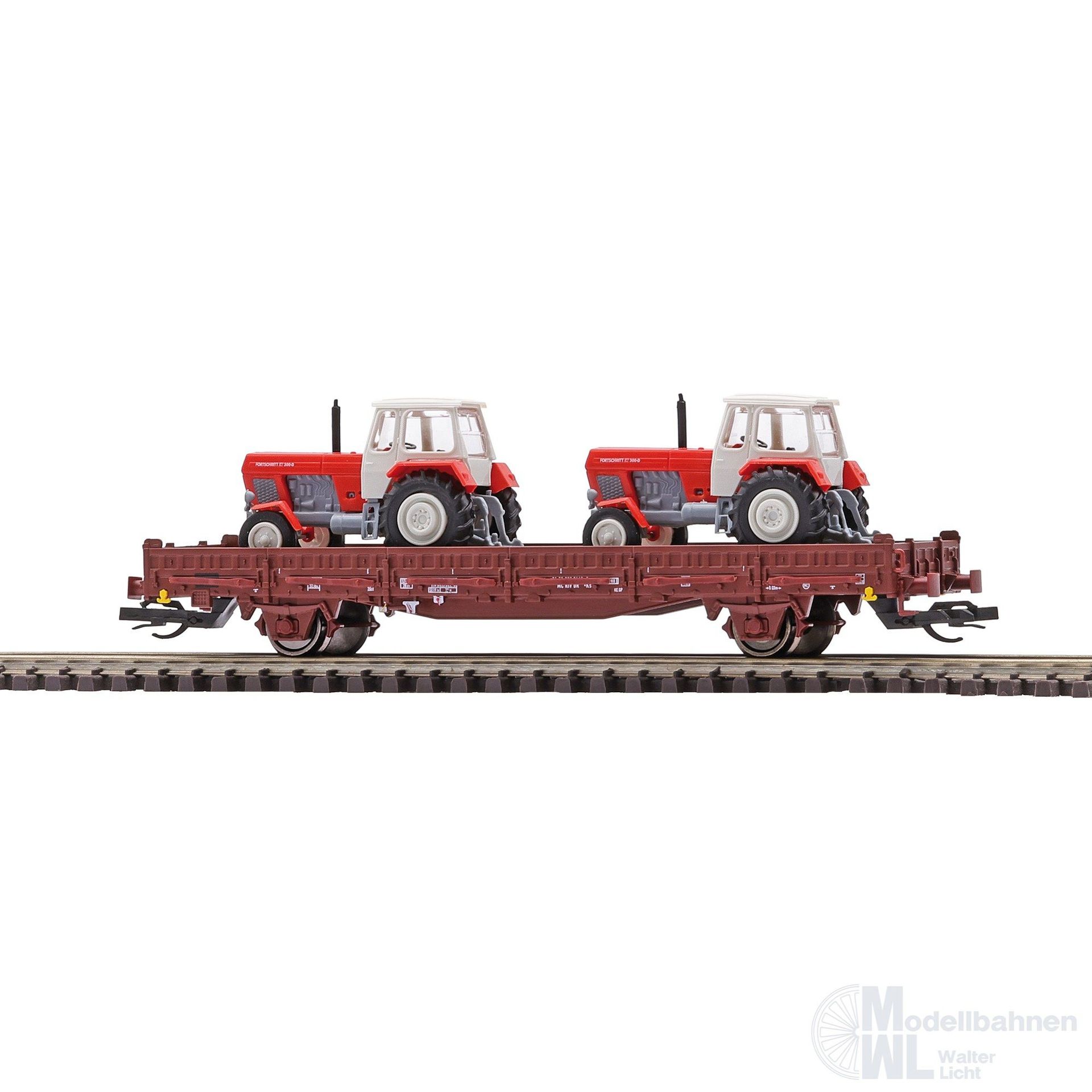 Busch 31514 - Flachwagen DR Ep.IV Rungen Ks 330 beladen mit 2 Traktoren TT 1:120