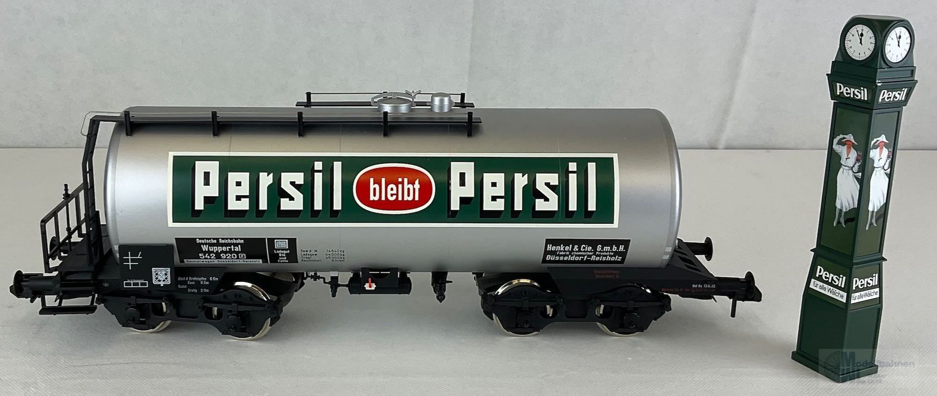 GEBRAUCHTWARE 58665 - MÄRKLIN - Kesselwagen DRG Ep.II PERSIL mit Persil-Uhr Spur 1 